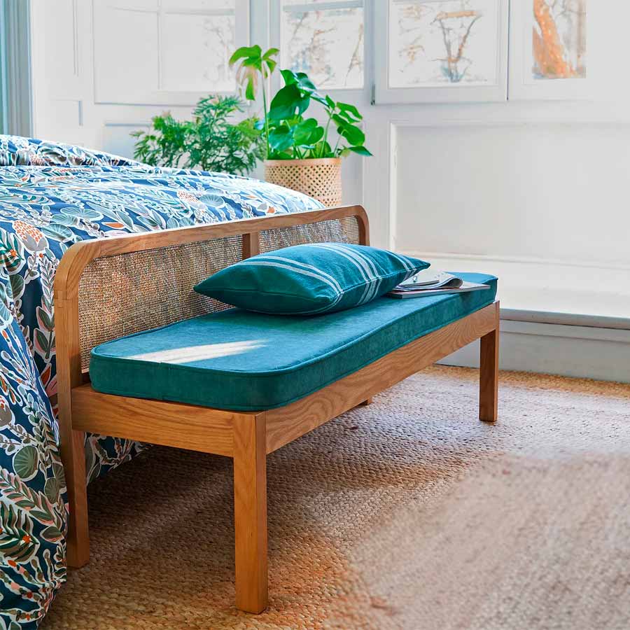 End of bed bench made of wood and rattan