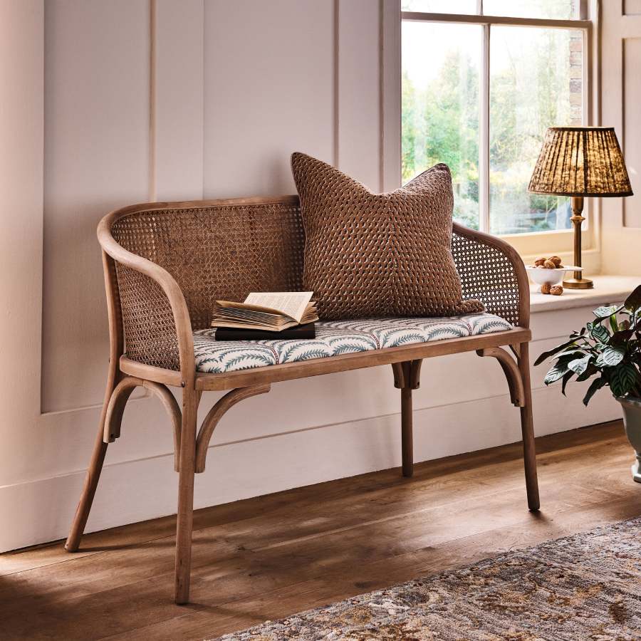 Etreinte Areca wood and rattan bench by OKA