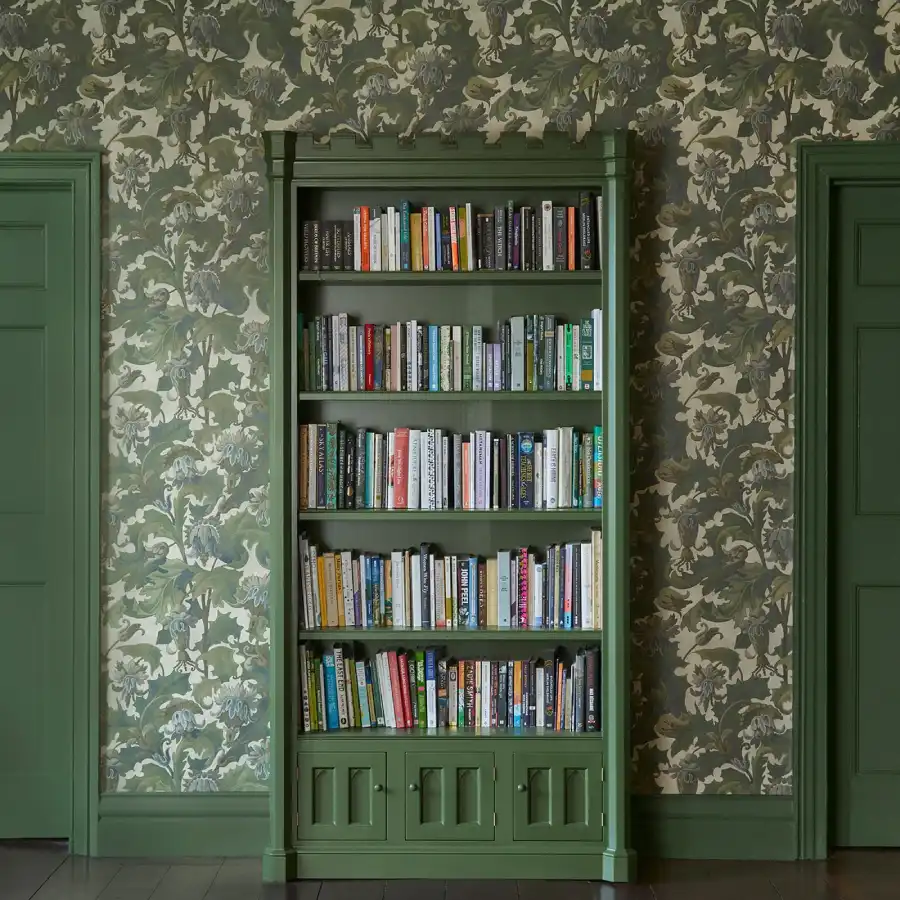 Green castle-shaped bookcase by House of Hackney