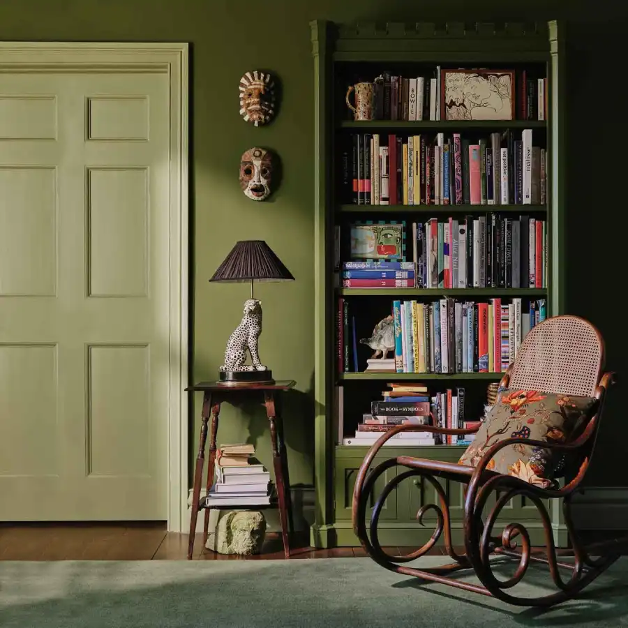 Green castle-shaped bookcase by House of Hackney