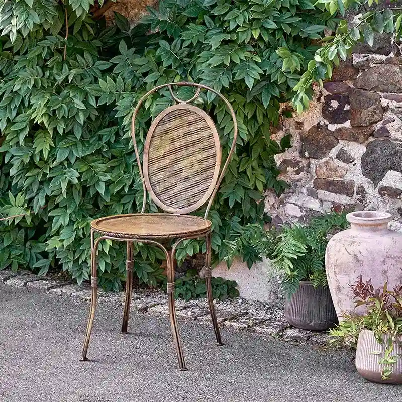 Parwaha iron garden chair by Nkuku