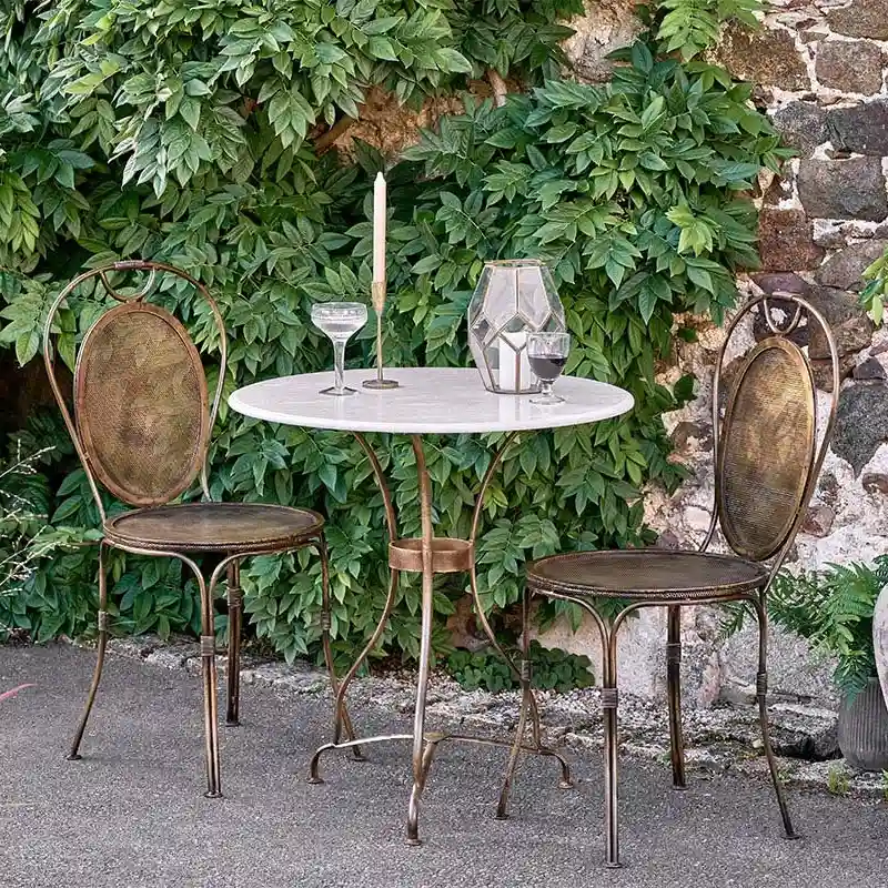 Parwaha iron garden chair by Nkuku